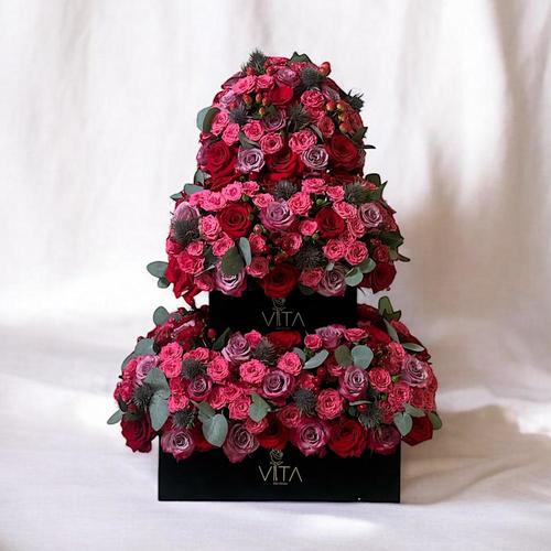 Spartan. - 2 black boxes contains mixed flowers Height: 75 cm Width: 40 cm