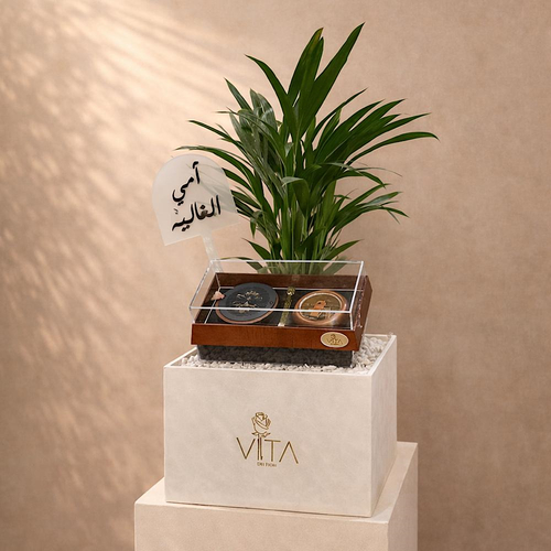 Leaf Love - A box featuring butterfly palm, acrylic box containing mubkhar and charcoal handle with an empty box and a topper.Height: 50 cmWidth: 40 cm