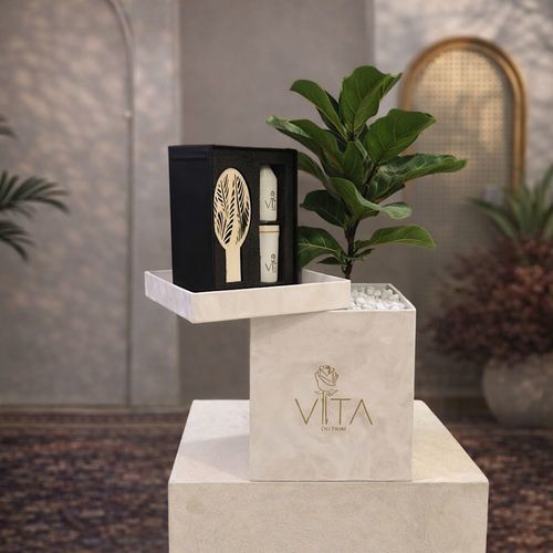 Fresh Roots - This white box contains&nbsp; a fiddle leaf fig plant, with a diffuser, a candle, and an oil perfume. Height: 50 Width: 20