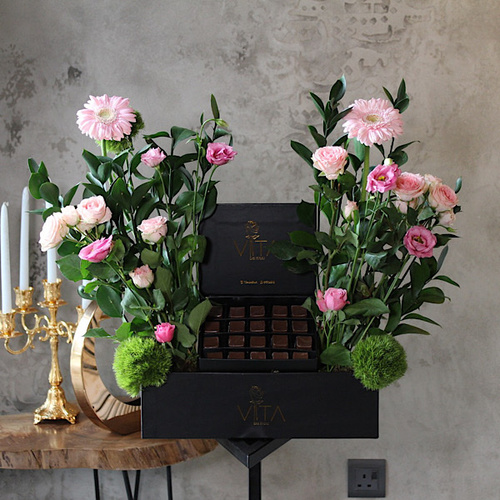 Foppish - Black box contains pink gerbera, pink baby roses and greens with 250 grams of chocolates. H : 50 W : 40