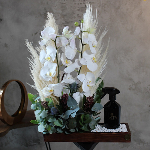 sense - A wooden tray contains white orchid flowers and artificial feathers with home fragrance. 
 H 70  w 30