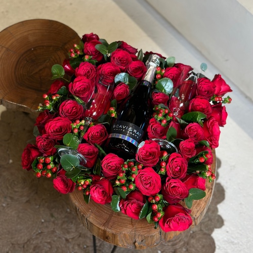 ENJOY - This black box contains red roses with a sparkling white grape drink and 2 crystal cups. Height: 20 Width: 40