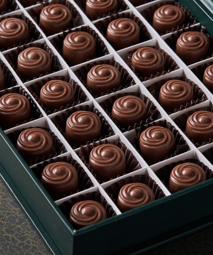 Salted Caramel Megabox - A grand box of 50 pieces of smooth salted caramel chocolate bonbons with powdered sugar