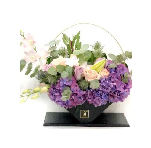 Alawael Flowers - A16 - Wooden base with metal handle contains natural flowers