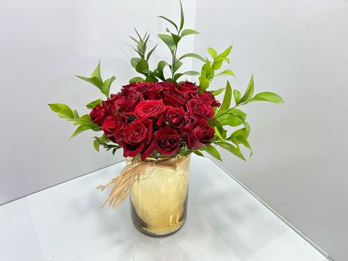 Love 11 - Glass vase with red roses, vegetables and raffia tie