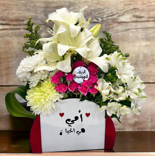 mother 17 - box with
  a group of elegant flowers with writing on the box