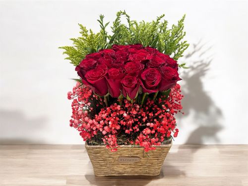 LOV 7 - Basket
  with a bunch of natural flowers