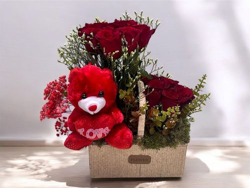 LOV 9 - Basket
  with a bunch of natural flowers