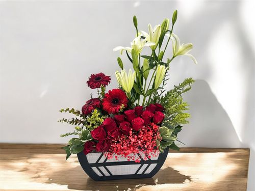 LOV 13 - Wooden
  box with a bunch of natural flowers