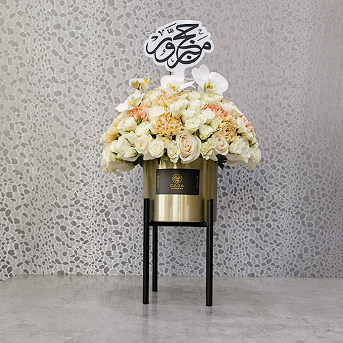 Hajj - Height: 50 cm
Width: 35 cm
This stand contains roses and baby roses.