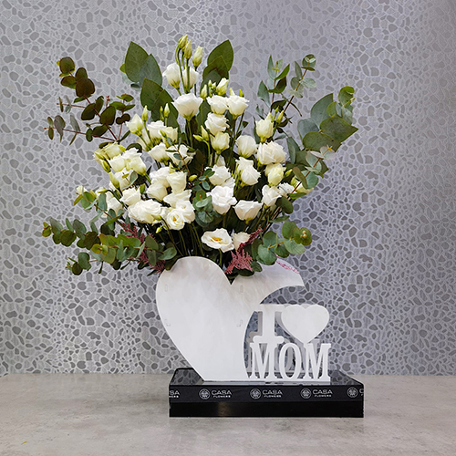 Mom White - Height: 65 cm
Width: 50 cm

This stand contains lisianthus flowers with eucalyptus.