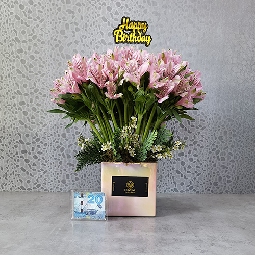 Lashay Pink - Height: 45 cm
Width: 40 cm

A box contains alstroemeria flowers with an acrylic money pocket. Note: money not included.