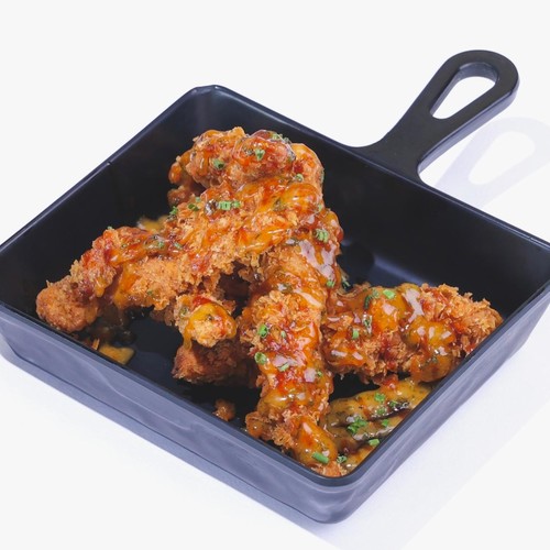 Chicken strips - Five peace fried chicken stripes with sauce on topping