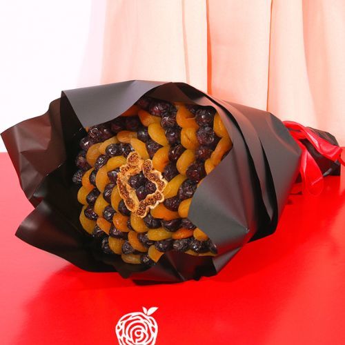 Fruit Flower - Life 1001 - The rays of the sun with luxurious Safawi dates and elegant dried apricots.
Height 32 cm  width 30 cm