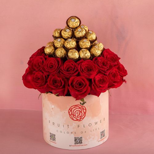 Ferrero Box 303 - 2 circles of red roses and Ferrero chocolate Height 40 cm width 24. cm