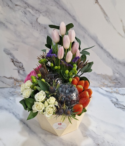 Berries Tray Strawberry 601 - Wooden tray consisting of pink tulips, baby rose white, eryngium, purple statis, uranguim  hypericam green, green rescus, black berries, blueberries, and strawberries height 40 cm x Width 35 cm