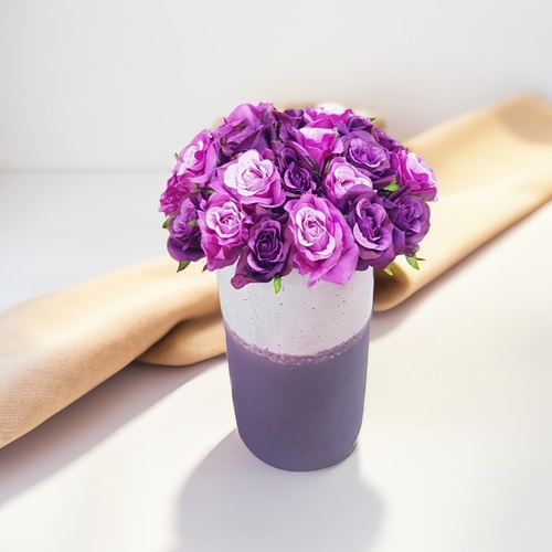 purple artificial baby roses in vase 1806 - Enhance the ambiance of any space with these stunning purple baby roses in a purple vase. The vibrant purple hue of the roses adds a pop of color, while the purple vase complements the flowers beautifully.  Perfect for both home and office settings, these artificial flowers require no care and will maintain their beauty for years to come.  With a height of 30 cm and a width of 18 cm