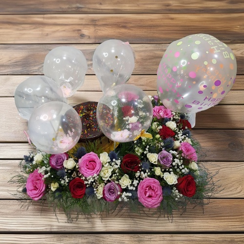 cake in a tray with flowers 1903 - The tray Includes Red and Pink, White Baby Roses, Eryngium, Wax Flower, Gypsophila, And Green 
 The Arrangement Contains 7 inch chocolate cake for 2 to 4 person and  Balloons In A tray. 
 Height 35 cm
 
 Width 50 cm