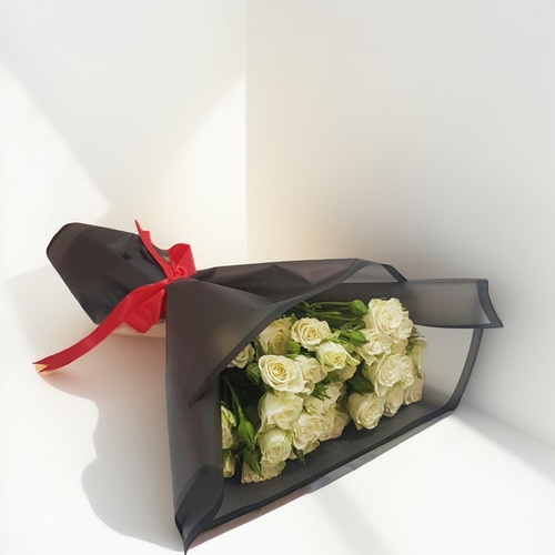 Baby roses bouquet 1133 - This elegant baby rose hand bouquet features delicate  roses beautifully wrapped in sleek paper. Perfect for any occasion, it combines classic charm with modern style, making it a thoughtful gift.