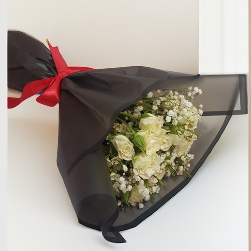 Baby Roses With Gypsophila And Wax Flower 1134 - This elegant bouquet features delicate roses, charming baby roses, and soft wax flowers, all beautifully arranged with Gypsophila. it offers a striking contrast that enhances the timeless beauty of the flowers. Perfect for any occasion, this hand bouquet is a sophisticated choice that conveys love and appreciation.