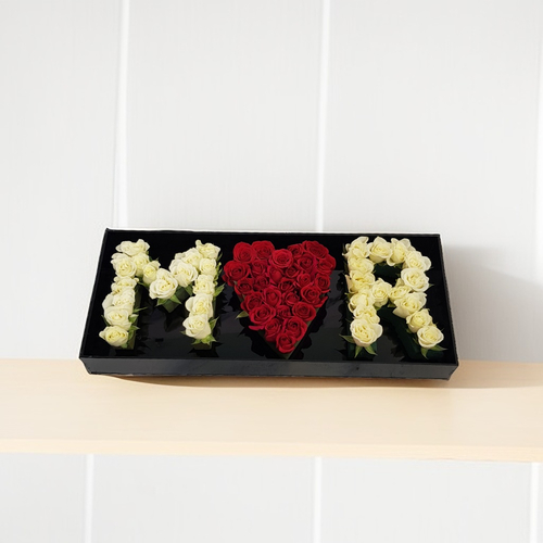 Two letters one heart 1209 - Surprise your loved one with our exquisite rose arrangement, beautifully presented in a stylish acrylic tray. This stunning display features two letters crafted with care, resting on an elegant acrylic tray. Measuring 40 cm in length and 16 cm in width, it’s the perfect gift for any occasion, adding a touch of romance and charm to your celebrations. Make your moments unforgettable with this delightful arrangement that speaks volumes of your affection.
