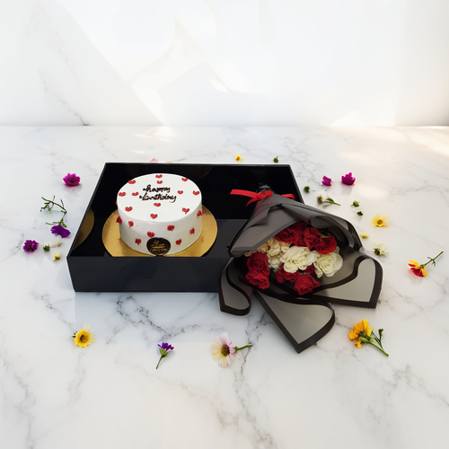 Cake And Hand Bouquet set in a acrylic tray 1913 - Celebrate any occasion with this delightful set featuring a 12.5 cm vanilla cake that serves about 6 people, beautifully paired with a hand bouquet of red and white baby roses. Arranged on a charming acrylic tray,
this combination makes for a perfect gift, adding a touch of elegance to your festivities. Enjoy the sweet flavors of the cake alongside the fresh blooms, creating a memorable experience for you and your loved ones.dimensions of the tray Height 15 cm
Width 36 cm
Length 26 cm