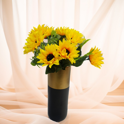 Artificial Sunflowers in a vase 1811 - Artificial sunflowers are carefully designed to replicate the natural beauty of real sunflowers with exceptional attention to detail. The petals of the artificial sunflower typically range in bright yellow to golden hues, with some variations of orange and brown near the center, mimicking the gradient found in fresh sunflowers.
 height 40 cm width 30 cm