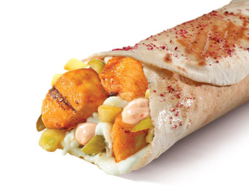 Taouk Special Sandwich - Grilled Taouk, garlic, little spicy sauce , pickles, sumac in lebanese bread toasted over charcoal