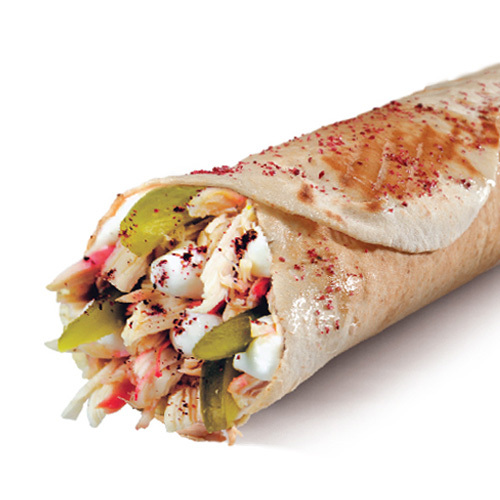 Classic Chicken Sandwich - Grilled chicken, garlic & pickles, sumac in Lebanese bread toasted over charcoal