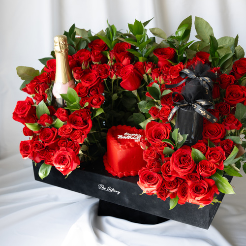 Premium Birthday Box - - Flower Arrangement of 50 Roses
 - Birthday Cake 3/4 Persons - Premium Non-Alcohol French Rosé Drink - 2 Premium Flute Glasses - Candles - Gift Card (Optional)