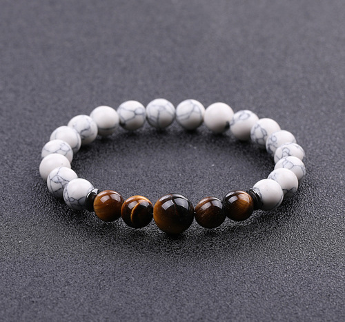 Vally - Handmade Real Natural Gemstone Beads Bracelets - Tiger Eye & White Howlite Stone - Overview & Details Color: Tiger Eye & White Howlite Stone Material: Natural stone Gender: Unisex Type: Bracelets 8mm beads with one 10mm middle bead 22cm – Stretchy elastic Bracelet weight: 16g The stone color will NOT fade Nickel & Zinc Free