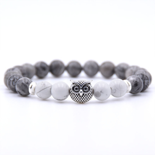 Jade Owl Pendant Stone Bracelet - Howlite Stone - Overview & Details Color: Grey Jade Stone with Howlite Stone Material: Natural stone Gender: Unisex Type: Bracelets 8mm beads 19cm – Stretchy elastic Bracelet weight: 22g The stone color will NOT fade Nickel & Zinc Free