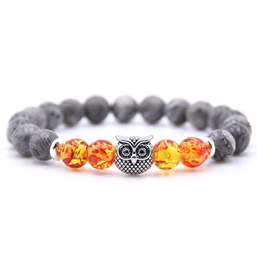 Jade Owl Pendant Stone Bracelet - Yellow & Red Beads - Overview & Details Color: Grey Jade Stone with Yellow & Red Beads Material: Natural stone Gender: Unisex Type: Bracelets 8mm beads 19cm – Stretchy elastic Bracelet weight: 22g The stone color will NOT fade Nickel & Zinc Free