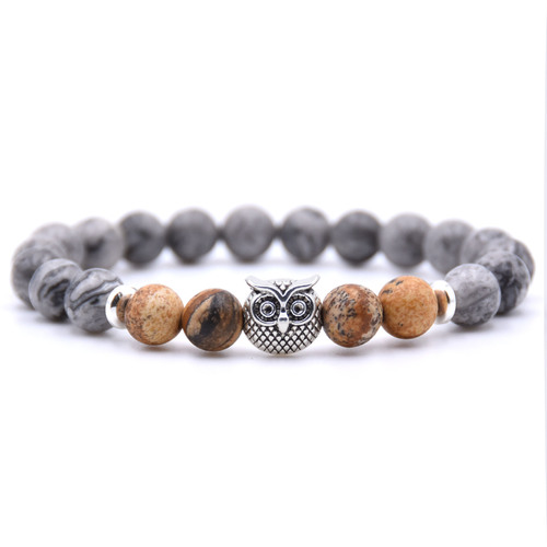 Jade Owl Pendant Stone Bracelet - Coffee Color Stone - Overview & Details Color: Grey Jade Stone with Coffee Color Stone Material: Natural stone Gender: Unisex Type: Bracelets 8mm beads 19cm – Stretchy elastic Bracelet weight: 22g The stone color will NOT fade Nickel & Zinc Free