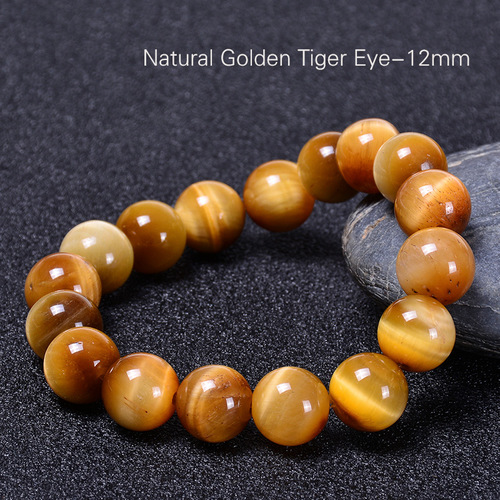 Natural Stone Bead Gemstone Bracelets - 12mm - Overview & Details Color: Gold Tiger's Eye Stone Material: Natural stone Gender: Unisex Type: Bracelets 12mm beads 18cm – Stretchy elastic Bracelet weight: 41g The stone color will NOT fade Nickel & Zinc Free