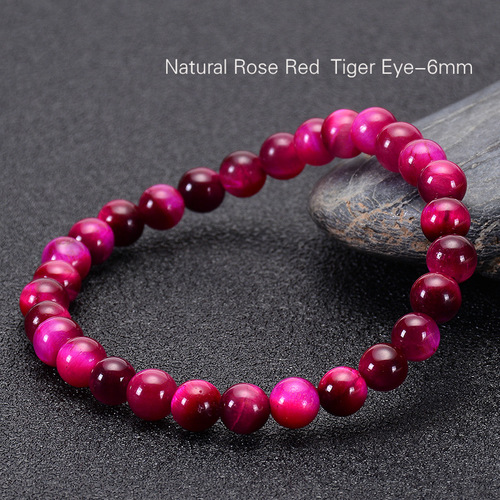 Hand Made Natural Stone Jade Bracelet - 6mm - Overview & Details Color: Rose Red Tiger's Eye Stone Material: Natural stone Gender: Unisex Type: Bracelets 6mm beads 18.5cm – Stretchy elastic Bracelet weight: 11g The stone color will NOT fade Nickel & Zinc Free