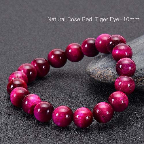 Hand Made Natural Stone Jade Bracelet - 10mm - Overview & Details Color: Rose Red Tiger's Eye Stone Material: Natural stone Gender: Unisex Type: Bracelets 10mm beads 18.5cm – Stretchy elastic Bracelet weight: 30g The stone color will NOT fade Nickel & Zinc Free