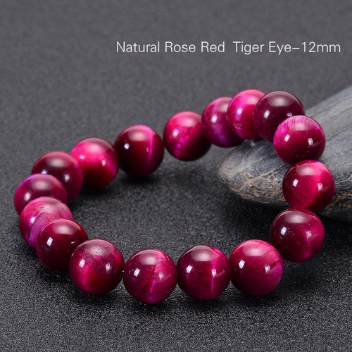 Vally - Hand Made Natural Stone Jade Bracelet - 12mm - Overview & Details Color: Rose Red Tiger's Eye Stone Material: Natural stone Gender: Unisex Type: Bracelets 12mm beads 18.5cm – Stretchy elastic Bracelet weight: 42g The stone color will NOT fade Nickel & Zinc Free