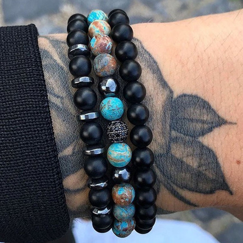 Charm Natural Stone Elastic Bracelet - Black & Turquoise - Overview & Details Color: Black & Turquoise Material: Natural stone Gender: Unisex Type: Bracelets 6-8mm beads 19cm – Stretchy elastic Bracelet weight: 50g The stone color will NOT fade Nickel & Zinc Free 3 Bracelets