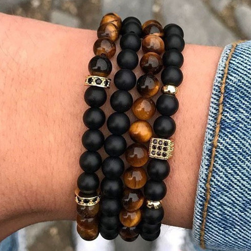 Charm Natural Stone Elastic Bracelet - Black & Brown - Overview & Details Color: Black & Brown Material: Natural stone & Square Metal Beads Gender: Unisex Type: Bracelets 8mm beads 19cm – Stretchy elastic Bracelet weight: 71g The stone color will NOT fade Nickel & Zinc Free 4 Bracelets