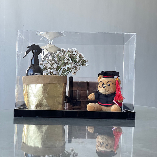 Graduation teddy bear - Box contains a box of 24 chocolates, perfume, a graduation bear and dried flowers