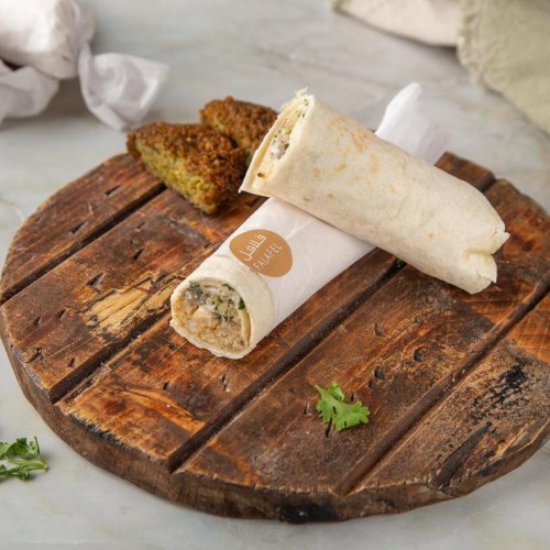 Falafel / Potato Sandwich - Falafel, Potato, Hummos, Crispy Bread, Parsley, Tahina/ Yoghurt Sauce wrapped in Tortilla Bread