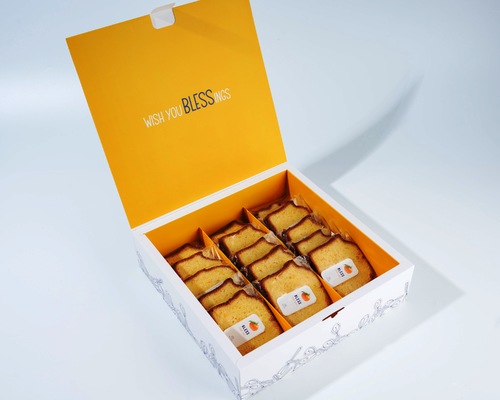 OJ Cake Box - 16 Slices of freshly baked OJ cake.